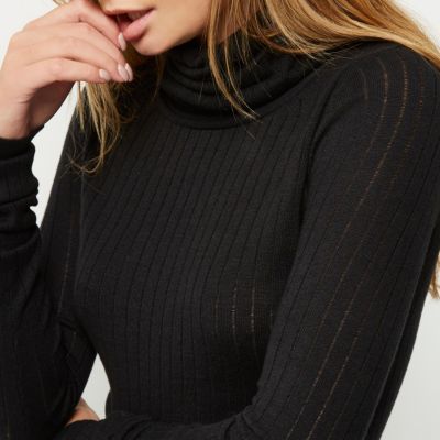 Black ribbed roll neck top